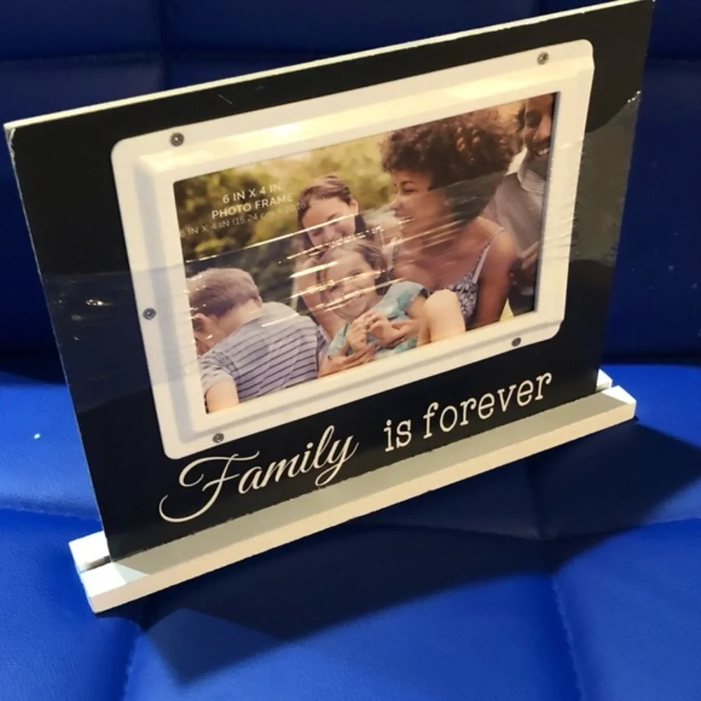2 photo picture frames, “Family is forever” & “family a whole lot of love